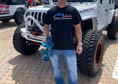 2021 Award winner man with white Jeep
