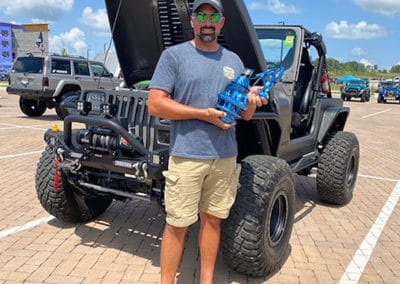 2021 Award winner man with charcoal metallic Jeep