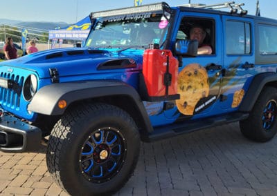 Blue metallic Jeep on display